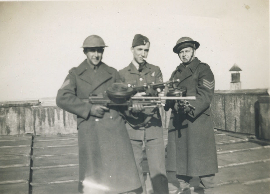 England, (April 1942)
Harry Duhnam, an airforce sgt. attache to us and Merv Knapp on roof (ack ack guard).