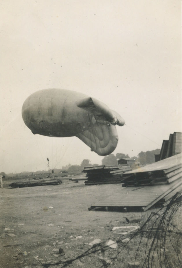 London (July 1942)
One of the large barrage balloons coming down to rest.